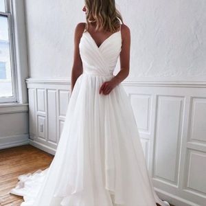 Stunning V neck frilly bottomed pink wedding dress. Tried on once.